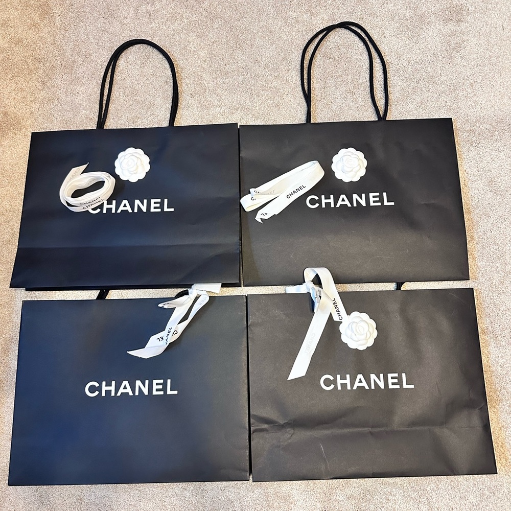 Set of 4 authentic CHANEL Large shopping/gift bag.